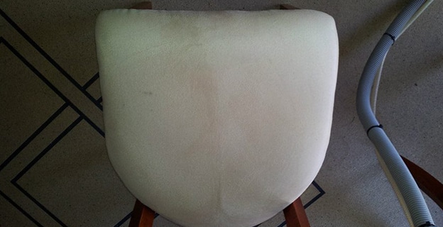 Side by Side Comparison of Dirty and Clean Chair — Upholstery & Carpet Cleaning on the Marcoola, QLD
