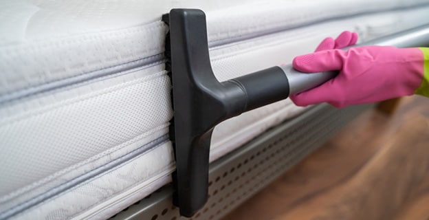 Side of Mattress Being Vacuumed — Upholstery & Carpet Cleaning on the Sunshine Coast, QLD