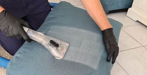 Dirt Removal from Sofa Pillow — Upholstery & Carpet Cleaning on the Peregian Beach, QLD