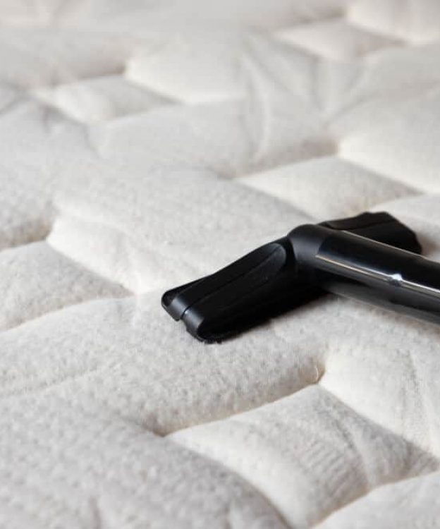 Cleaning White Mattress by Vacuum Cleaner — Upholstery & Carpet Cleaning on the Yandina, QLD